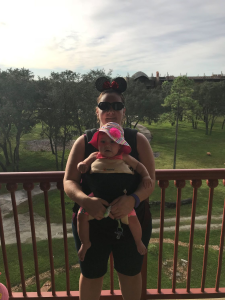 Baby in carrier at Disney World.