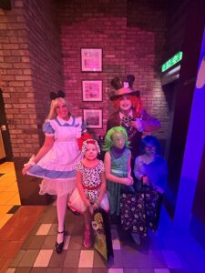 Kids with Alice and Wonderland characters on Allure of the Seas. 