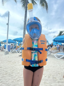 Child with snorkeling mask.