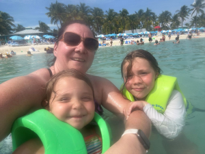 Mom and kids swimming at CocoCay.